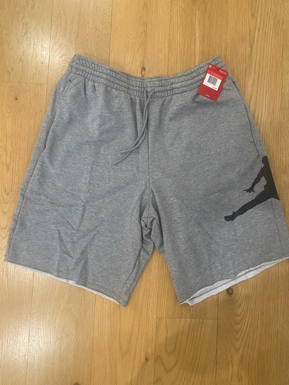 Jordan Men's Gray Athletic Drawstring Shorts with Black Jumpman